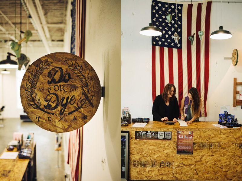 Do or Dye HTX front desk and round wood logo sign