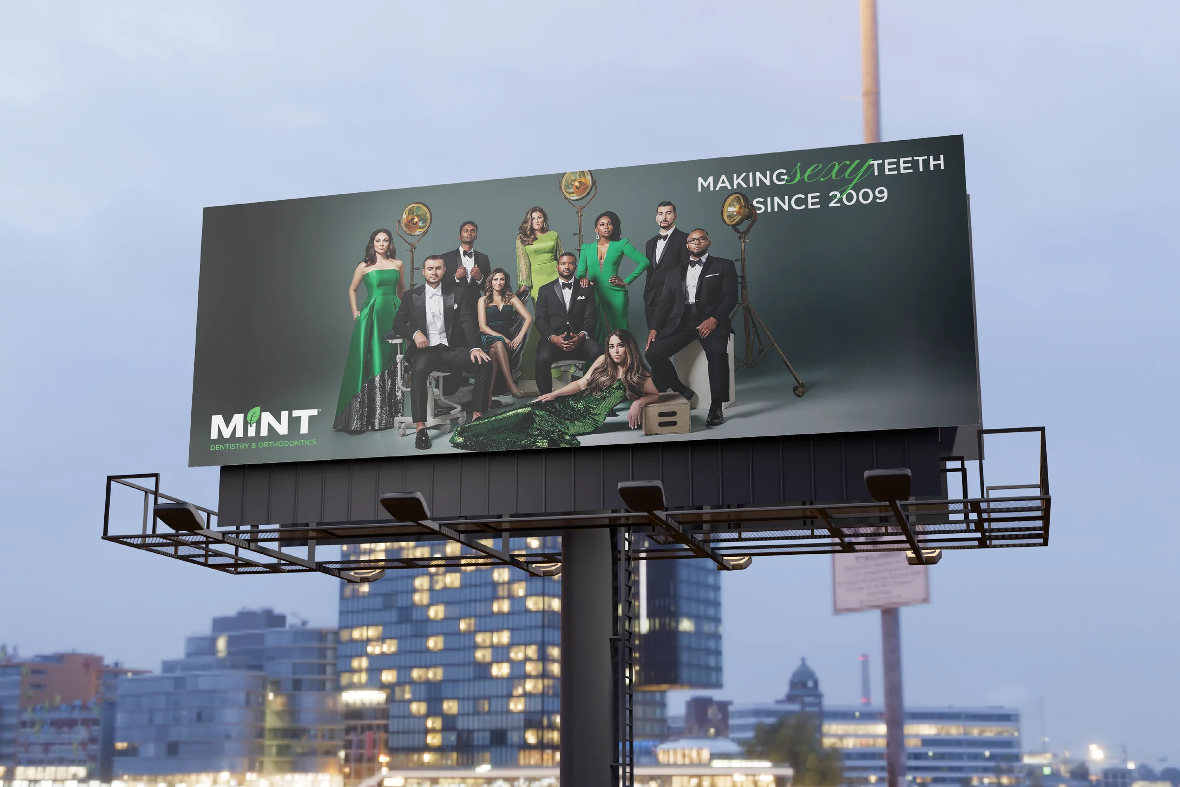 MINT dentistry billboard on a Texas highway reading Making Sexy Teeth Since 2009